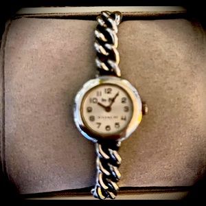 Ladies authentic Coach watch. Stainless